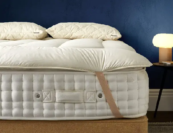 A wool mattress pad